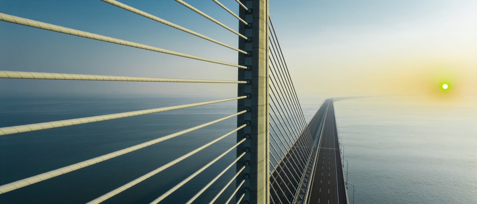 Cable-stayed bridge reaching across open water